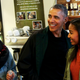 President Barack Obama buys ice cream for his daughters Malia and Sasha at Pleasant Pops during Small Business Saturday on November 28, 2015, in Washington, DC.